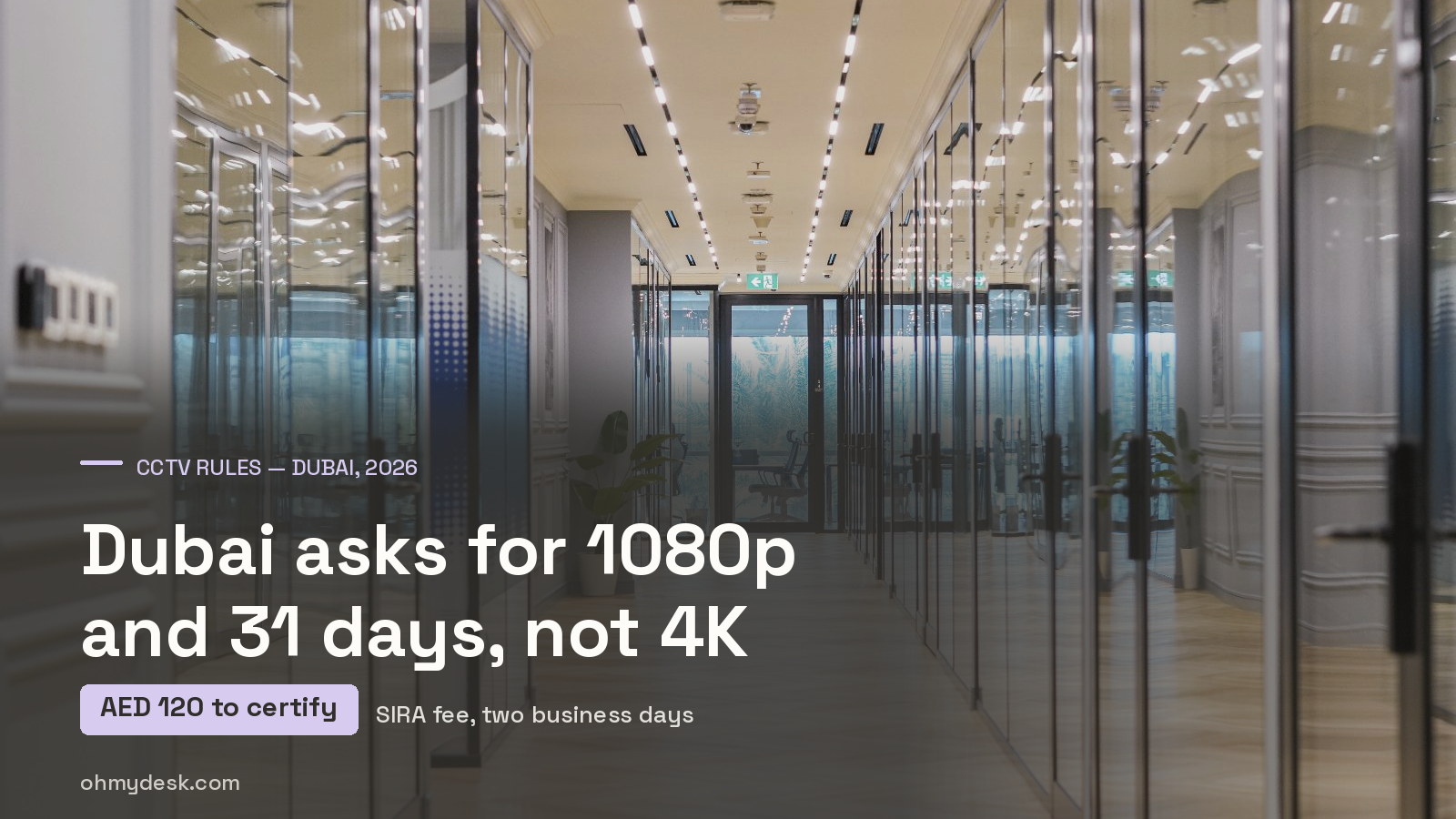 Corridor of glass-partitioned offices at Oh My Desk Business Bay in Dubai, the setting for the emirate's security system rules