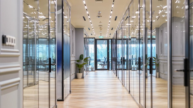 Glazed private offices along a corridor at Oh My Desk Business Bay Dubai, thumbnail for the fit-out cost guide