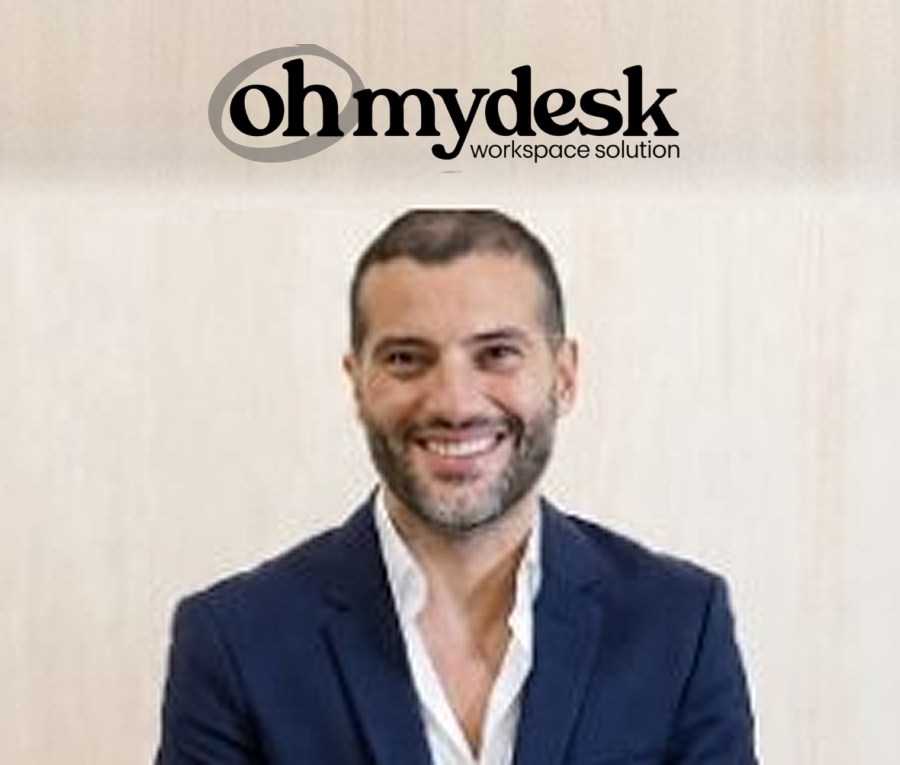 Headshot of Guillaume Rassemi in a navy blazer